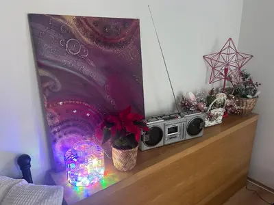 a microwave sitting on a shelf with christmas decorations at Just BE that´s enough!! in Prague