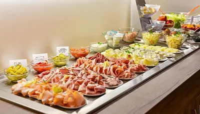 a buffet line with many different types of food at Hotel Prague Star in Prague