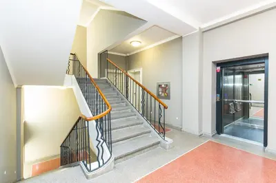 a staircase in a house with a glass door at TOP location OLD town brand new 2BD apartment in Prague
