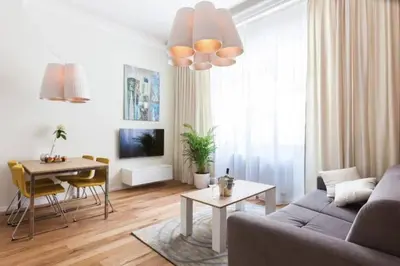 a living room with a couch and a table at UNIQUE Old Town apartments at Palace Dlouha in Prague