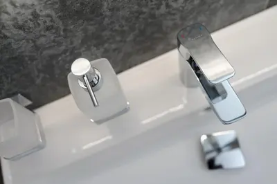 a bathroom with a sink with two faucets at AIRSTAY PRAGUE apartment Vinohrady in Prague
