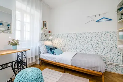 a small bedroom with a bed and a desk at Charming APT Old Town Prague by Michal&Friends in Prague