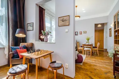a living room with a chess board on a table at APT near OLD TOWN Prague by Michal&Friends in Prague