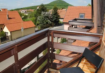 a balcony with a view of a roof at Chalet Lucie in Mnetěš