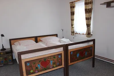 a kitchen with a sink and a refrigerator at Bendovský dvůr in Dušníky