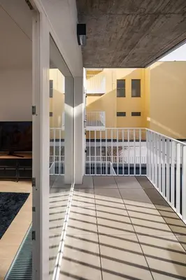 a view of the balcony of a house at Prague Days - Apartment with Balcony and Parking in Trendy New Residential Area in Karlín in Prague