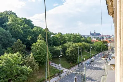 a view of a street with trees and a city at Lovely 2BDs apartment near Petřín Tower - P14 in Prague