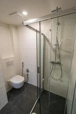 a bathroom with a shower and a toilet at Main train station apartment close to the the Main Square! in Prague