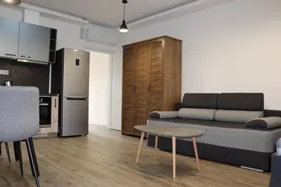 a living room with a couch and a table at Vyhlídka Slapy Nová Živohošť in Křečovice