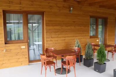a patio with a table and chairs on a house at Vyhlídka Slapy Nová Živohošť in Křečovice