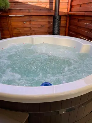 a jacuzzi tub filled with lots of water at Ubytování U Synagogy Dobříš in Dobříš