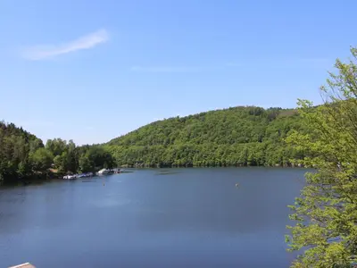 a view of a lake with a mountain at Holiday Home Měřín by Interhome in Rabyně