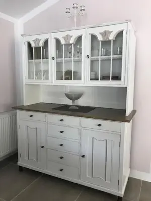 a white cabinet with a sink in a room at Apartman Romantica in Poděbrady