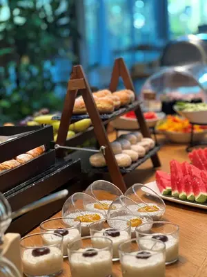 a buffet with a lot of food on a table at Blue Orange Resort in Prague