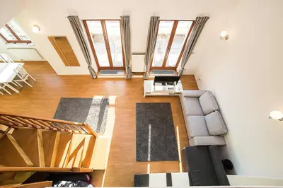 an overhead view of a living room with windows at Great Terrace in Big, Central Flat in Prague