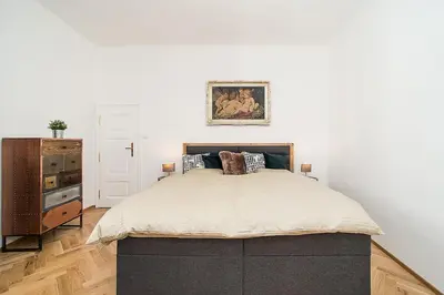 a bedroom with a large bed in a room at Newly renovated 1-bed apartment at Charles Bridge in Prague