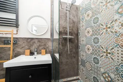 a bathroom with a sink and a shower at Central designer studio by beautiful park & church in Prague