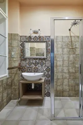 a bathroom with a sink and a mirror at Prague Days - Studio in the Heart of Prague near Astronomical Clock in Prague