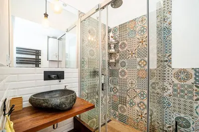 a bathroom with a sink and a glass shower at Elegant, modern, 2-bed flat by Museum of Prague in Prague