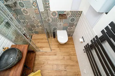 a bathroom with a sink and a toilet at Elegant, modern, 2-bed flat by Museum of Prague in Prague