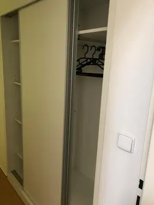 a glass closet door with a mirror in a room at Klidné místo v Měsíčním údolí Poříčí nad Sázavou in Poříčí nad Sázavou