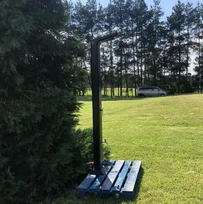 a pole sitting in the middle of a field at River wellness in Jince