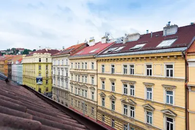 a group of buildings with red roofs at Hotel Libero in Prague