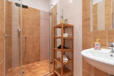 a bathroom with a shower and a sink at The BEST LOCATION in Prague, Charles Bridge & Old Town Square in Prague