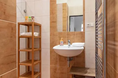 a bathroom with a sink and a mirror at The BEST LOCATION in Prague, Charles Bridge & Old Town Square in Prague