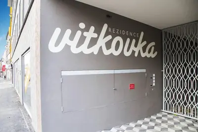 a sign on the side of a building at Bright studio, 10min to the Centre, free Parking in Prague