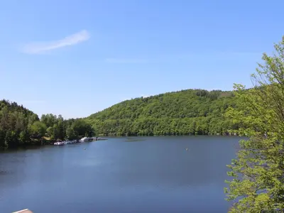a view of a lake with a mountain at Apartment Rabyně-2 by Interhome in Rabyně