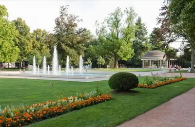 a fountain in a park with a gazebo at Walter&Sons Apartment Centro in Poděbrady