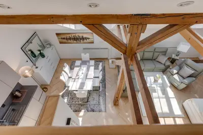 an overhead view of a living room and dining room at Wenceslass Square Royal Residence Apartments in Prague