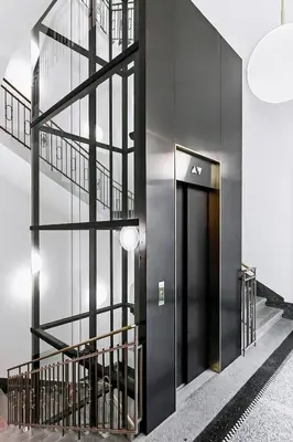 a building with a glass wall and a door at Luxury apartments in the city centre in Prague