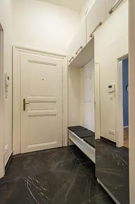 a room with a door and a walk in closet at Stylish apartment in Prague best gastronomic area in Prague