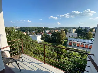 a balcony with a view of a city at Apartman Xaveriova in Prague
