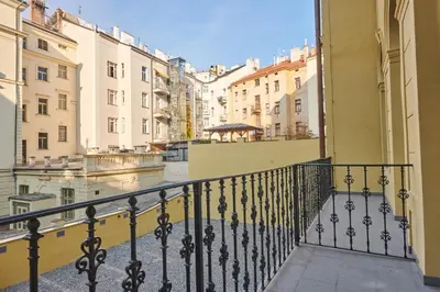 a view of a city from a balcony at Pytloun Bristol Residence Prague in Prague