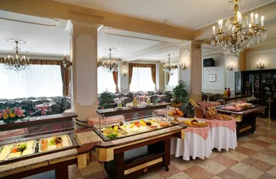 a buffet line with many different types of food at Ambassador Zlata Husa in Prague