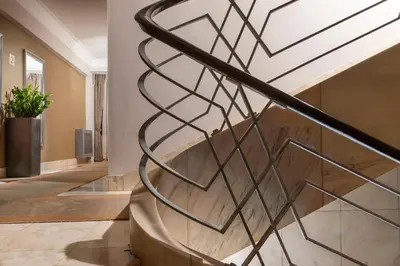 a metal spiral staircase in a house at Jalta Boutique Hotel in Prague