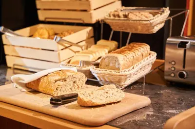 a buffet line with many different types of food at Jalta Boutique Hotel in Prague