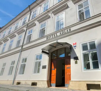 a building with a hotel advisor sign over the door at Hotel Adler - Czech Leading Hotels in Prague