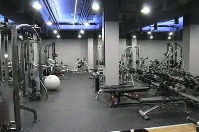 a gym with a lot of equipment in a room at OREA Hotel Andels Praha in Prague