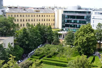 an aerial view of a building with trees and a park at Adria Hotel Prague in Prague