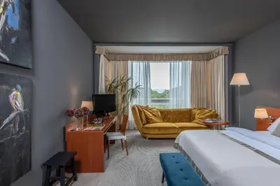 a hotel room with a bed and a couch at Art Hotel Prague in Prague