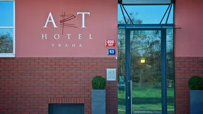 a t hotel sign on the side of a building at Art Hotel Prague in Prague