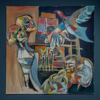 a painting of a person with a bird on a table at Art Hotel Prague in Prague