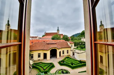 a view of a castle from a window at Aria Hotel Prague in Prague