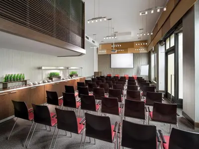 a conference room with chairs and a podium at Clarion Hotel Prague Old Town in Prague