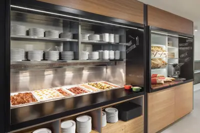 a bakery with many different types of food at Comfort Hotel Prague City in Prague