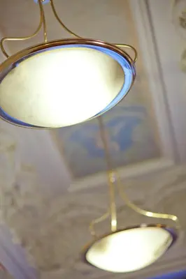 a lamp that is attached to a ceiling at Hotel Tivoli Prague in Prague